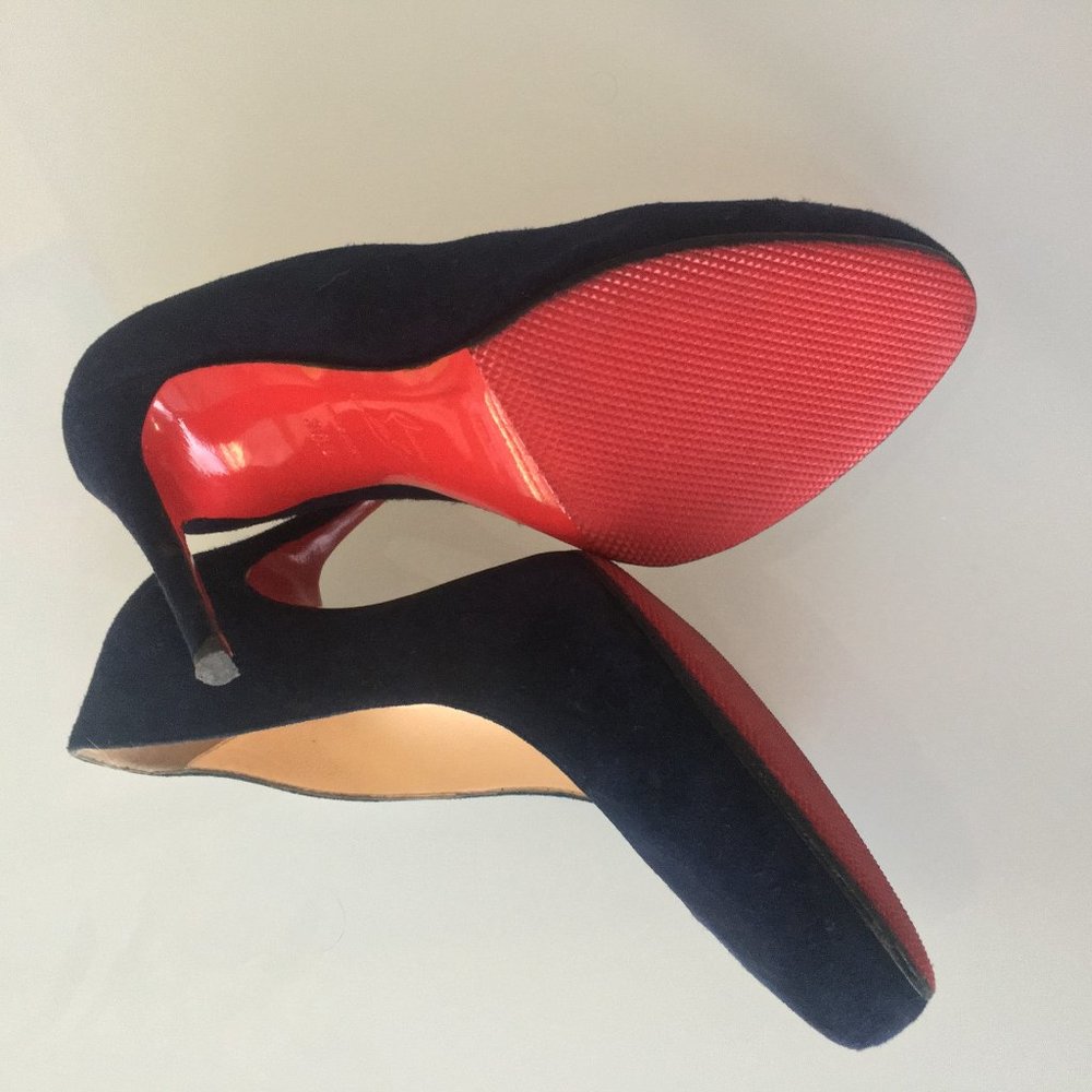 Navy blue suede Christian Louboutin pumps